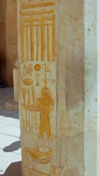 Egyptian hieroglyph carving on column in Hatshepsut temple, Egypt