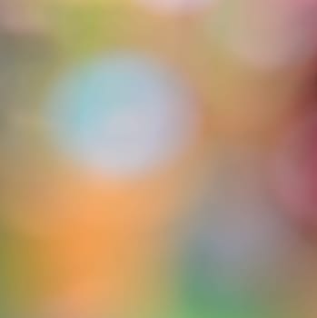 Colorful bokeh abstract background of de-focused lights