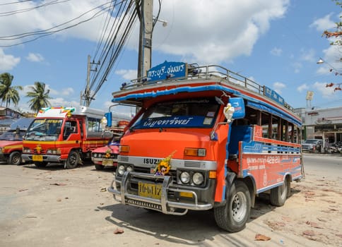 RANONG , THAILAND - FEBRUARY 20, 2015 : Public transport of wooden minibus or Songtaew in Ranong, Thailand.