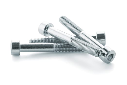 Hex head bolt screws thread on white background.
