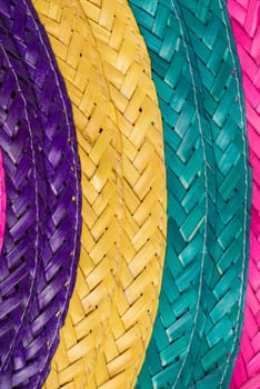 Abstract colorful background of woven straw.