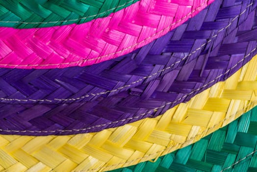 Abstract colorful background of woven straw.