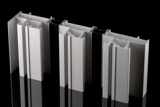 Aluminium profile sample isolated on black background.