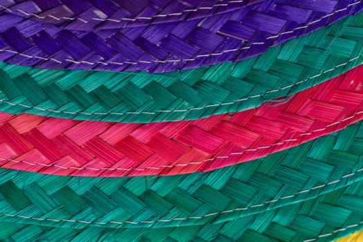Abstract colorful background of woven straw.