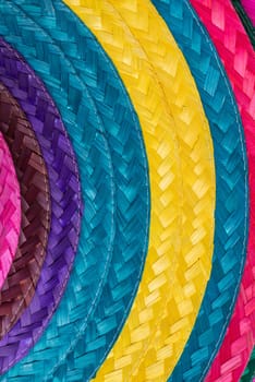 Abstract colorful background of woven straw.