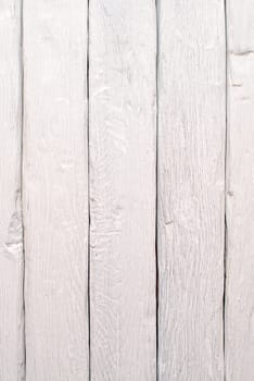 Closeup detail of white painted wood background.