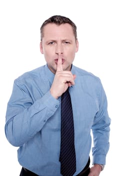 Handsome male executive instruct to keep silence