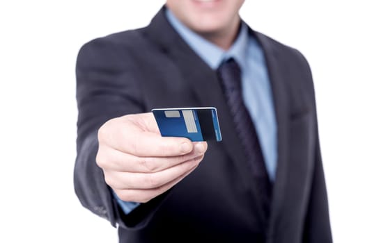 Cropped image of a businessman giving credit card