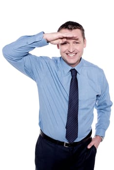 Corporate executive keeping his hand on forehead