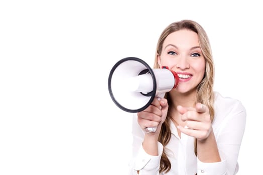 Young woman with a megaphone and finger point towards camera