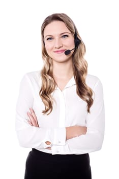 Smiling attractive woman with crossed arms wearing headphone