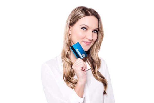 Young lady showing her credit card to the camera
