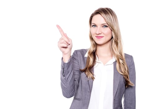 Beautiful woman pointing away, copy space concept