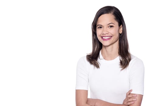 Mixed race casual lady posing with  folded arms