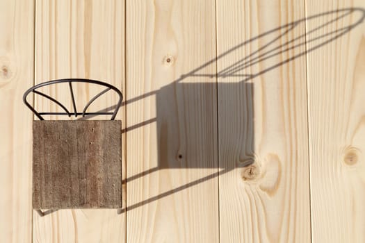 chair and shadow on the wooden floor
