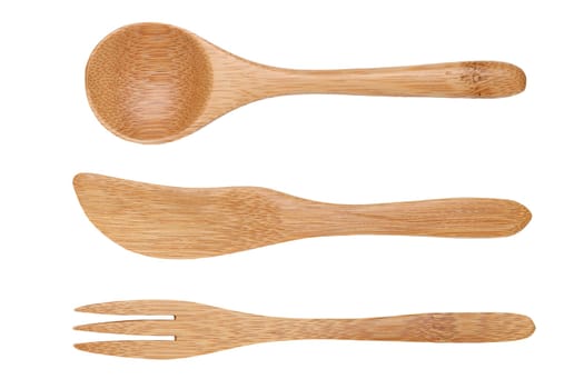 natural wooden spoon and fork, knife isolated on wood background