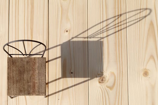 shadow of chair on the wooden floor