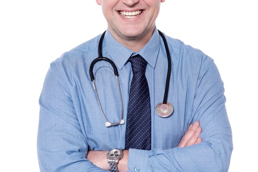 Cropped image of a smiling male doctor with folded arms