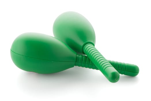 Pair of green maracas isolated on a white background.