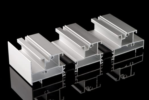 Aluminium profile sample isolated on black background.