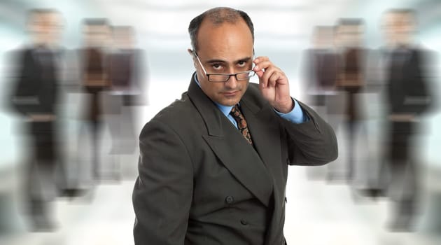 mature business man thinking taking off his glasses