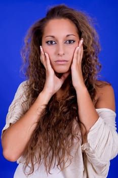 young beautiful woman, on a blue background