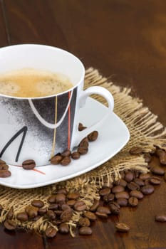 cup of coffee and coffee beans