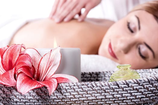 Pretty woman on shoulder massage in salon