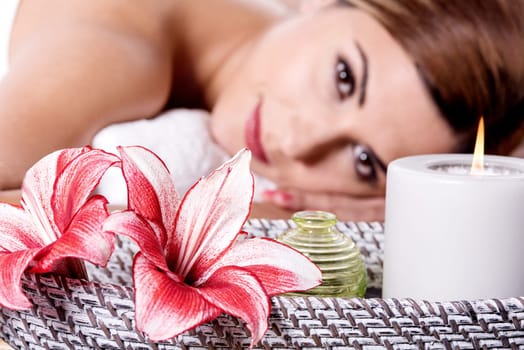 Beautiful woman looking at camera in  spa center
