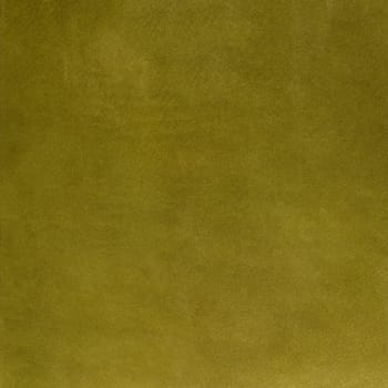 Closeup detail of green leather texture background.
