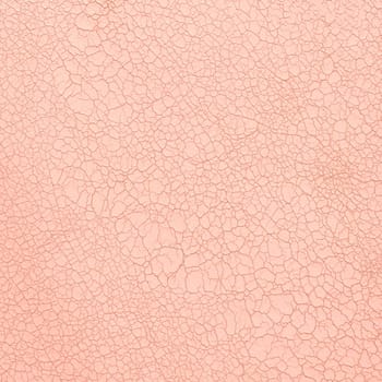 Closeup on cracked pink leather texture background.