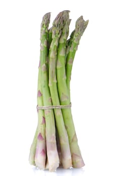 Fresh green asparagus isolated on white background