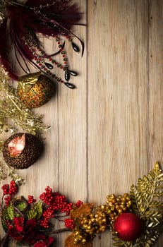 Christmas decorations frame on a wooden board.