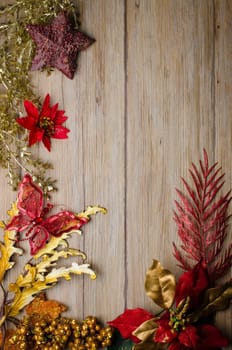 Christmas decorations frame on a wooden board.