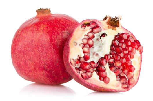 Ripe pomegranate fruit with half isolated on white background.