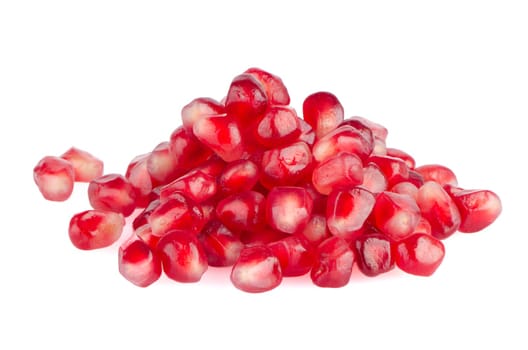 Pomegranate seed pile isolated on white background.