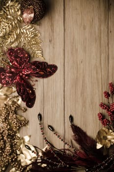 Christmas decorations frame on a wooden board.