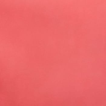 Closeup on cracked pink leather texture background.