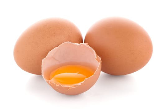 Raw eggs isolated on white background