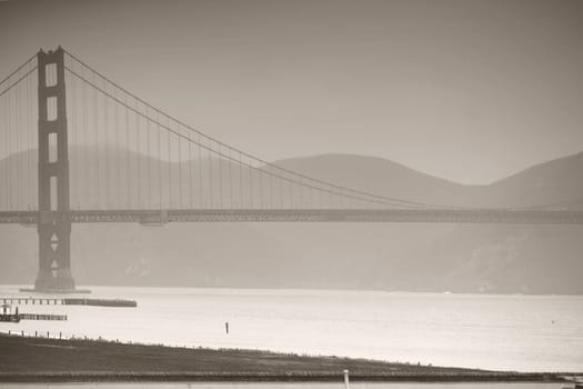 The Golden Gate Bridge in this rainy weather and in monochrome.