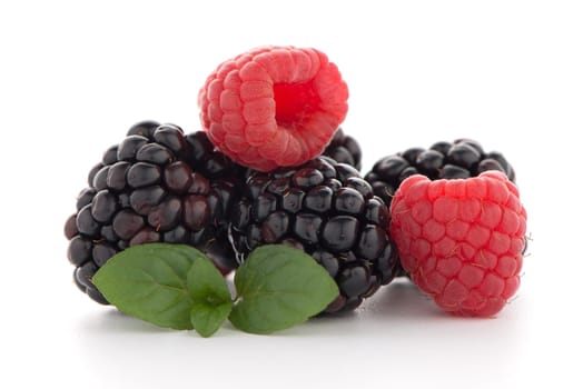 Raspberry with blackberry on white background.