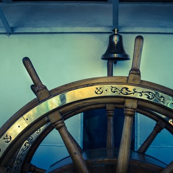 Steering wheel of an old sailing vessel, close up