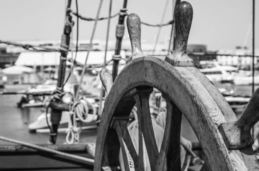 Steering wheel of an old sailing vessel, close up