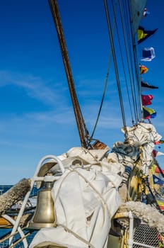 Mast with sails of an old sailing vessel