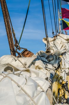 Mast with sails of an old sailing vessel