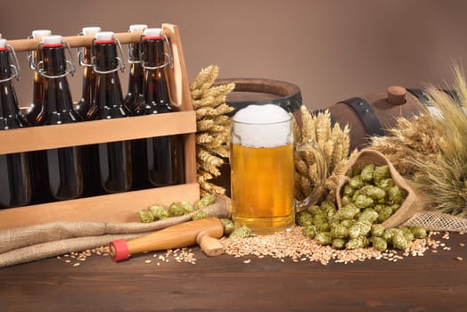 beer carrier,keg and beer glass with wheat,barley,hops and malt\n