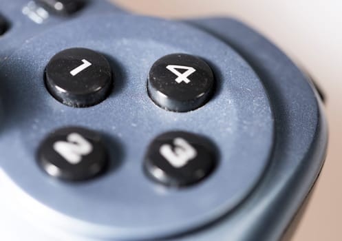 Video Game Controller buttons close up.