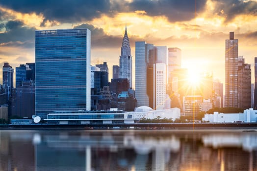 New York City skyline with urban skyscrapers at sunset, USA.