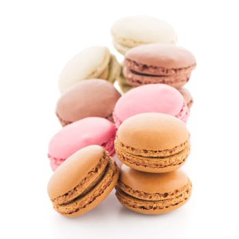 Colorful French Macarons on the white background.