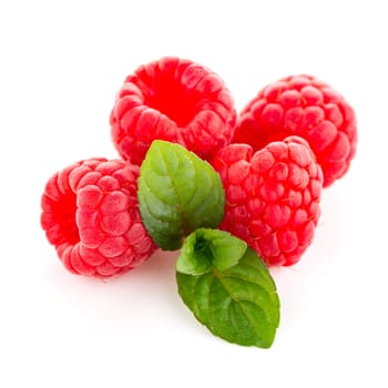 Raspberries with leaves isolated on white background